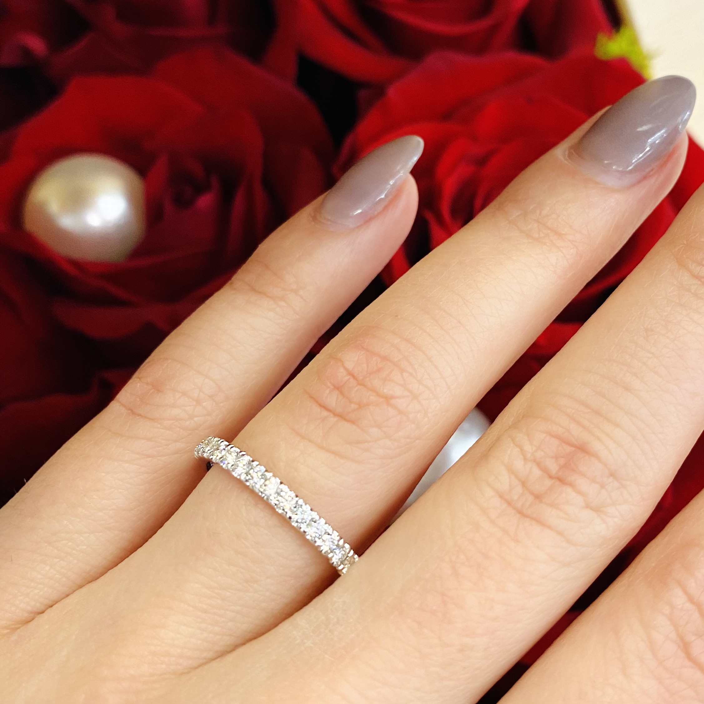 Lady's 14 Karat White Gold Natural Diamond Wedding Band With