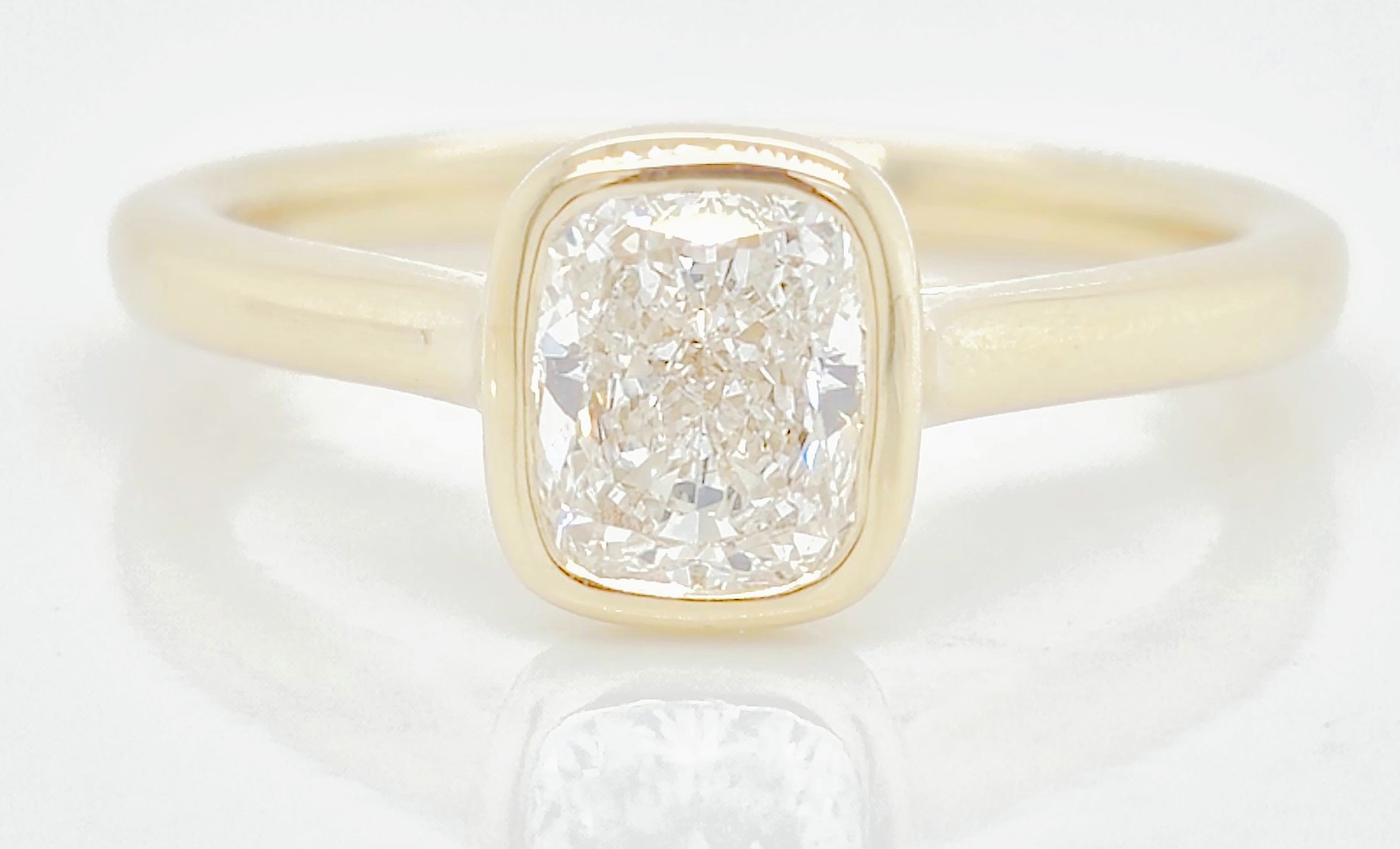 1.01ct Elongated Cushion Bezel Set Engagement Ring