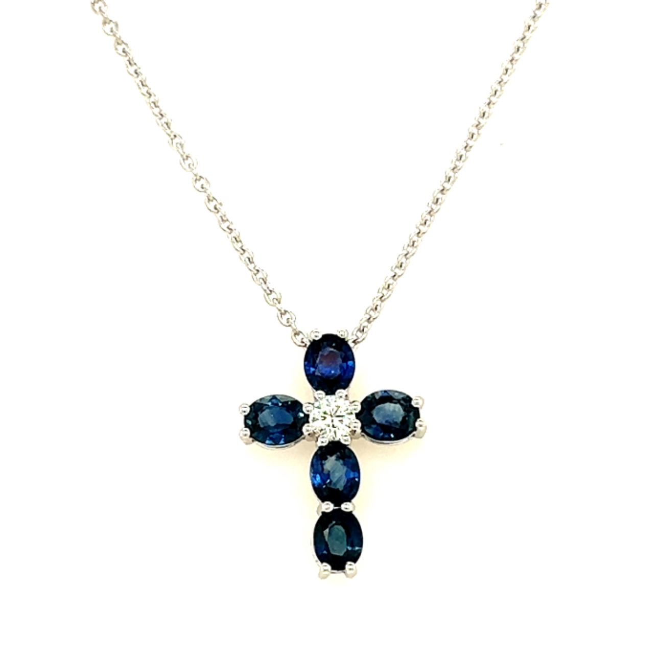 14 Karat White Gold Oval Cut Blue Sapphire and Round Diamond
