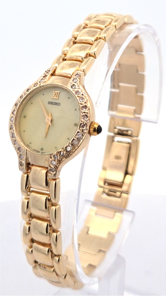 green emerald velvet dress Ladies SEIKO Essentials Gold Plated Quartz Link Watch SUR632 – Wexford  Jewelers main image 0