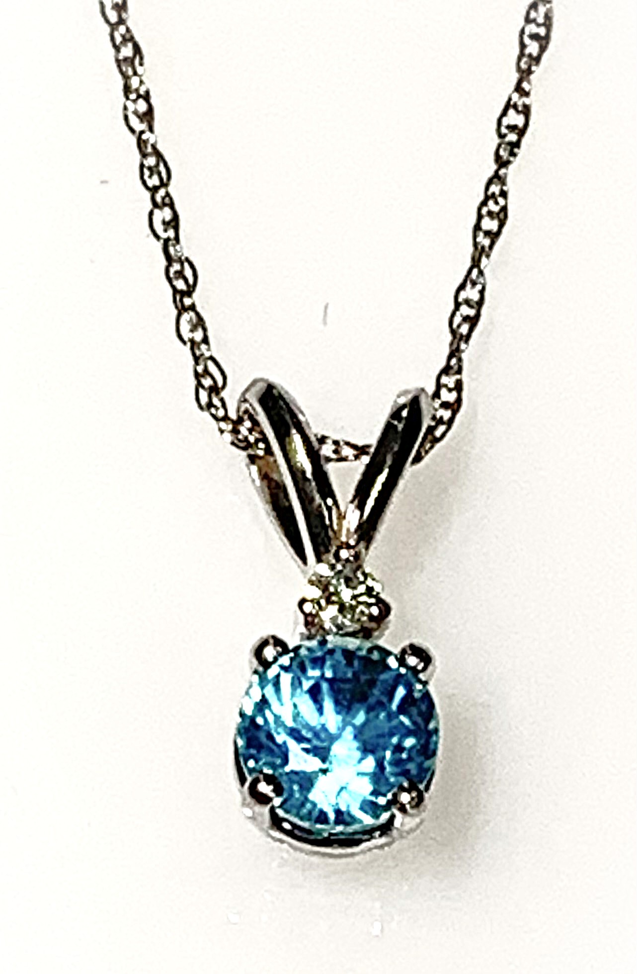 14 Karat White Gold Blue Zircon and Diamond Fashion Pendant - Main Image