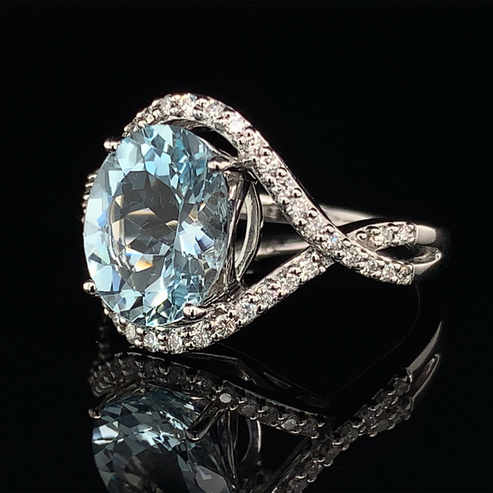 Aquamarine And Diamond Twisted Halo Style Ring