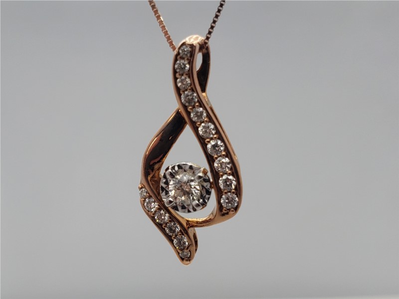 14k rose gold twist pendant with diamonds